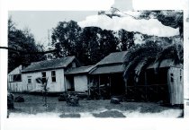 Father Philip Blom, SS.CC., in front of Catholic Mission, Kalawao, Molokai.